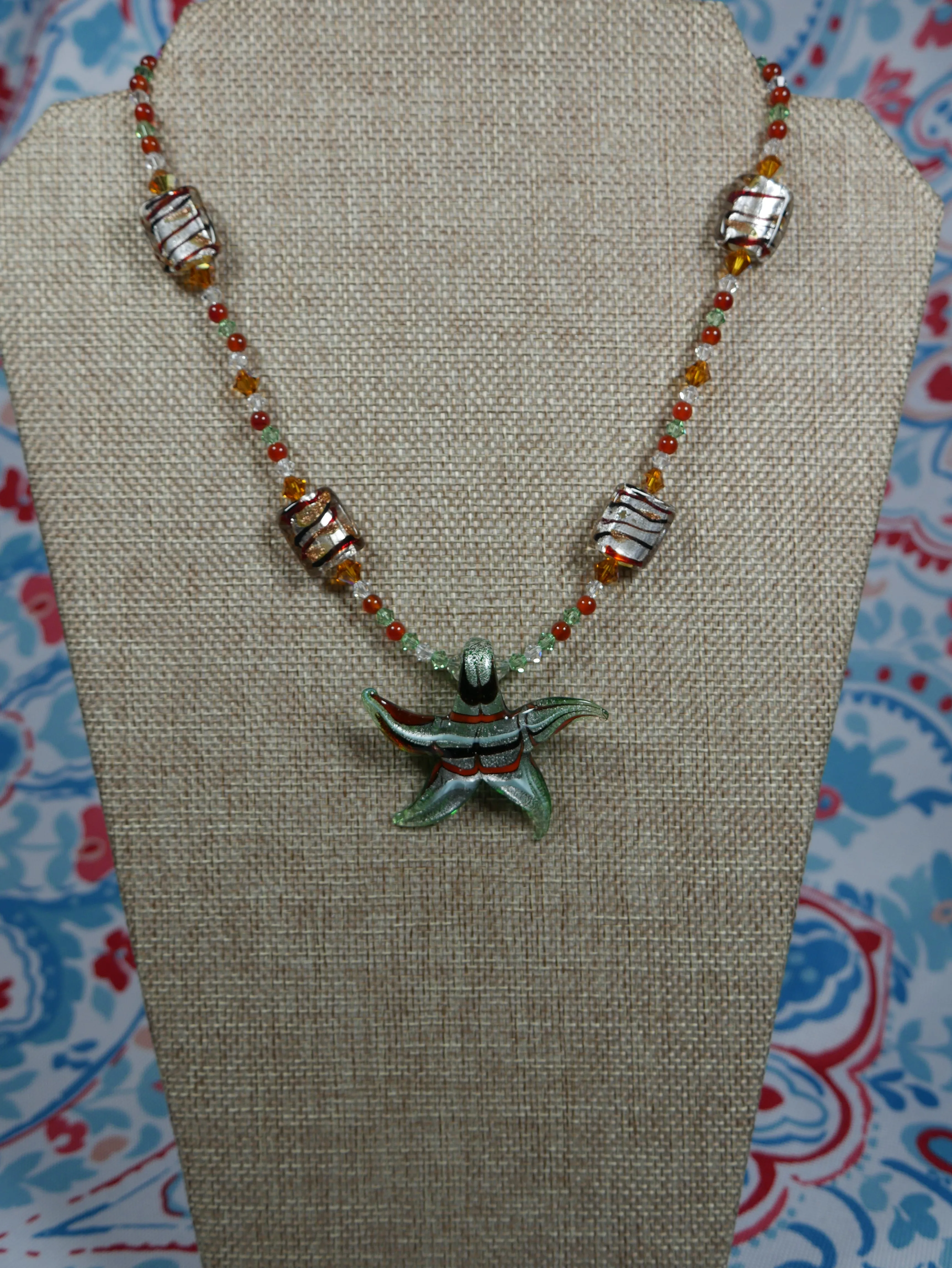 Earth Tone Beaded Necklace with Lampworked Glass Star Pendant and Bicone Crystals