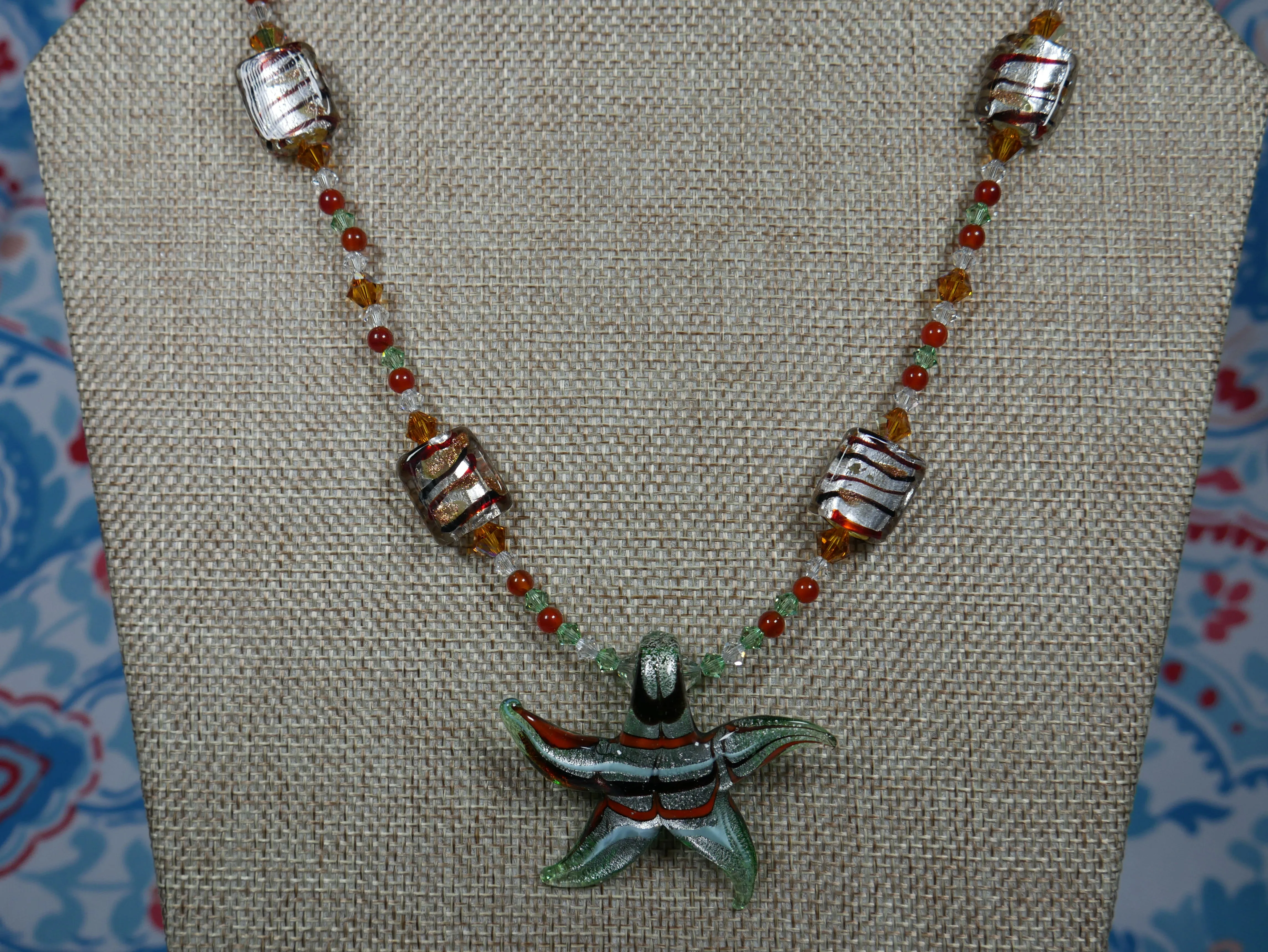 Earth Tone Beaded Necklace with Lampworked Glass Star Pendant and Bicone Crystals